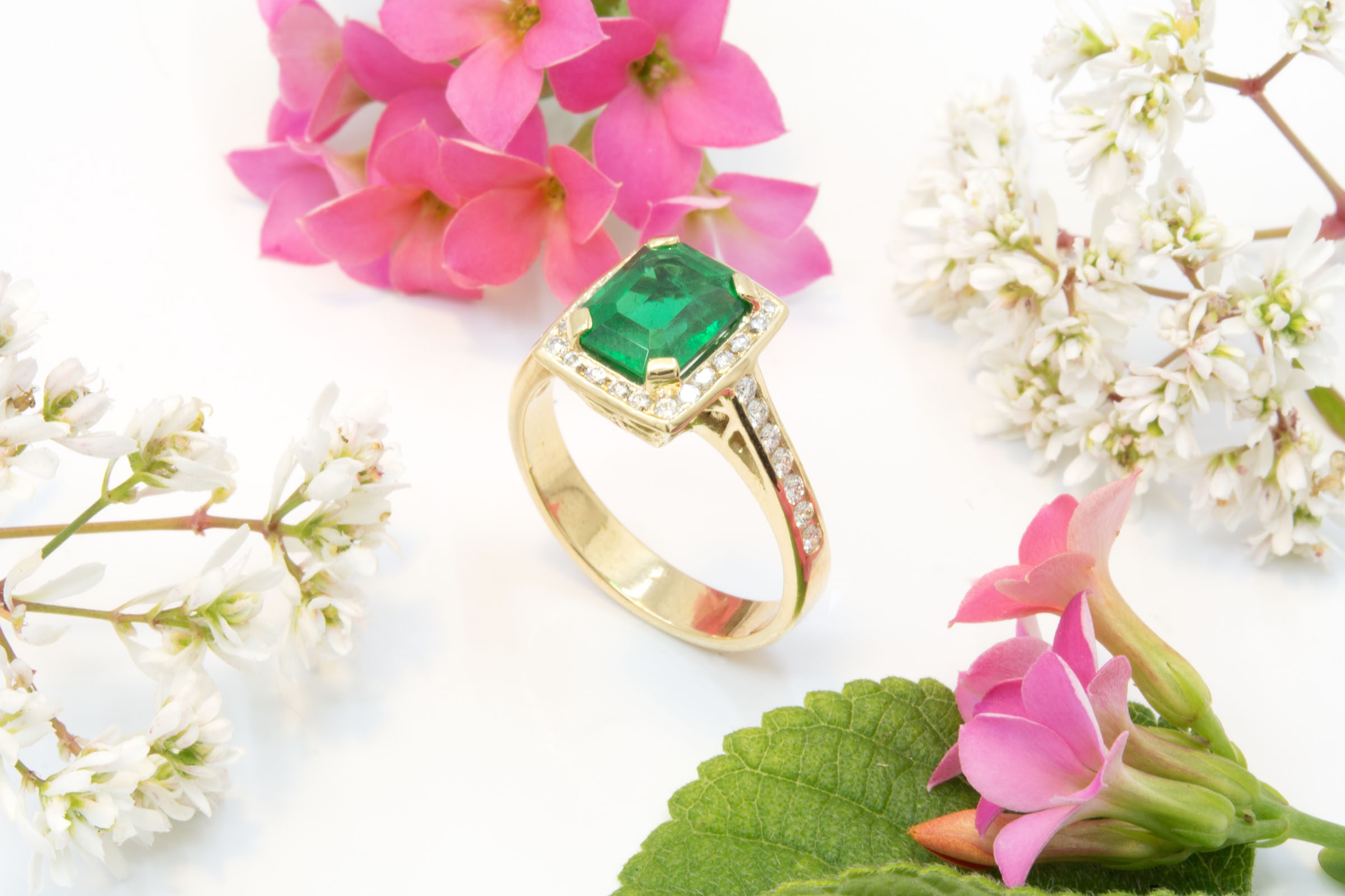Emerald Ring with Diamond Halo