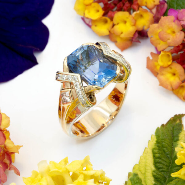 Aquamarine in 18K Rose and White Gold with Diamond Melee